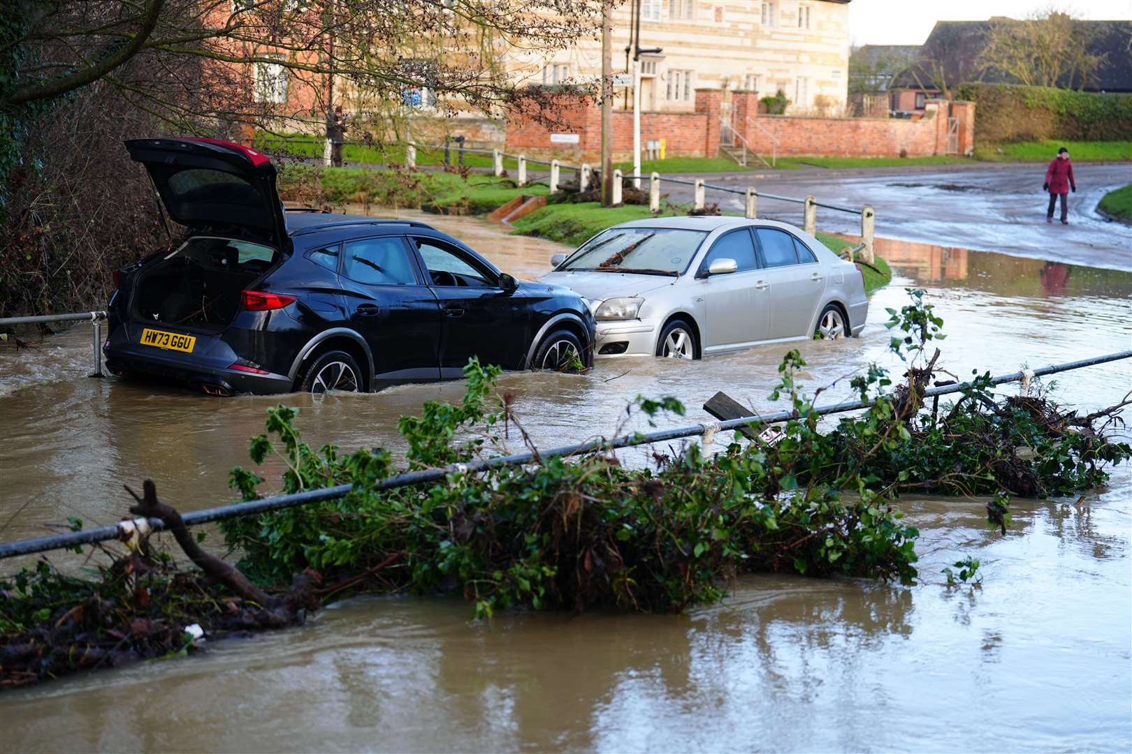 Vehicles were trapped in flood water near the River Devon, in Bottesford, Leicestershire (Mike Egerton/PA)