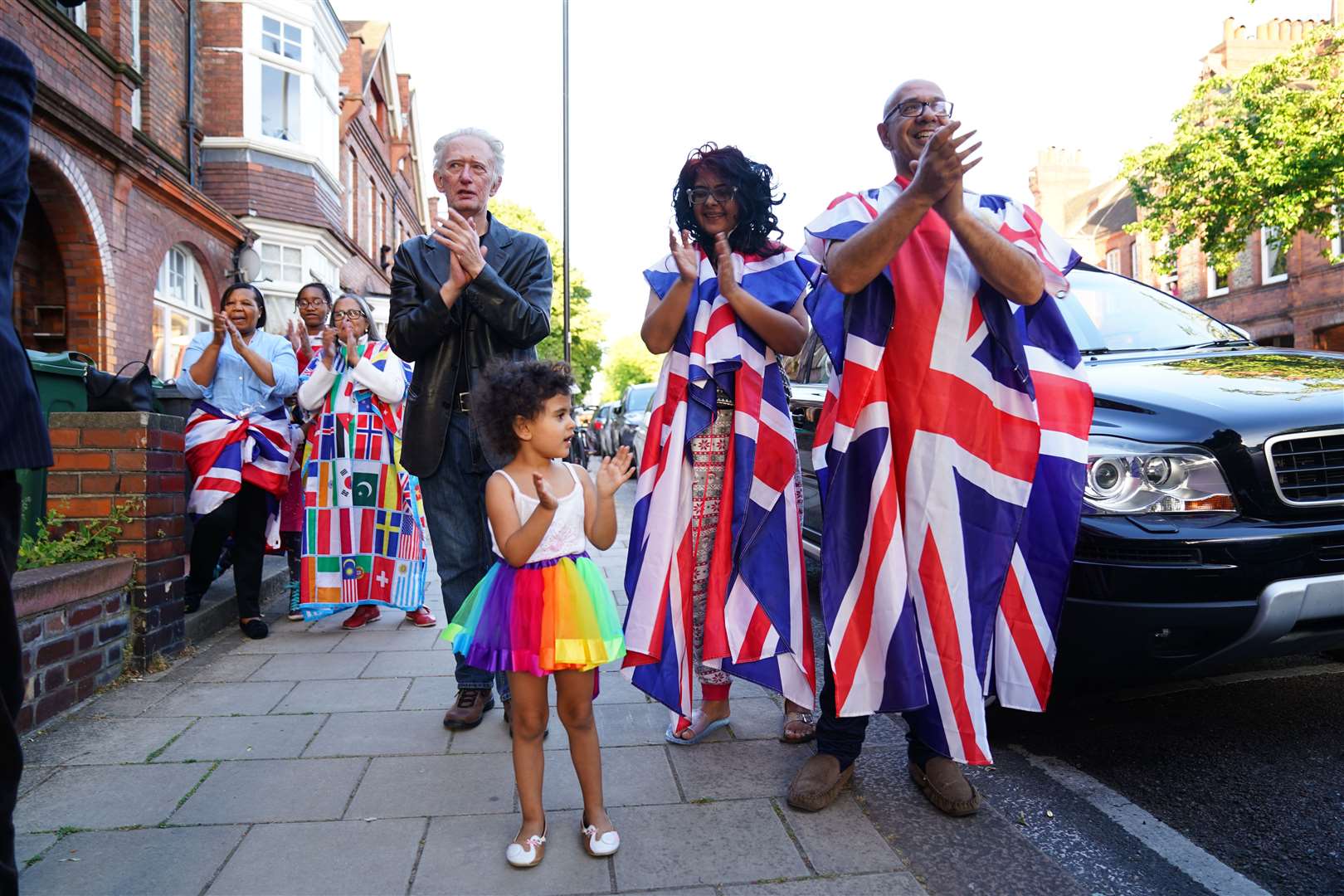 Applause from south London residents (Aaron Chown/PA)