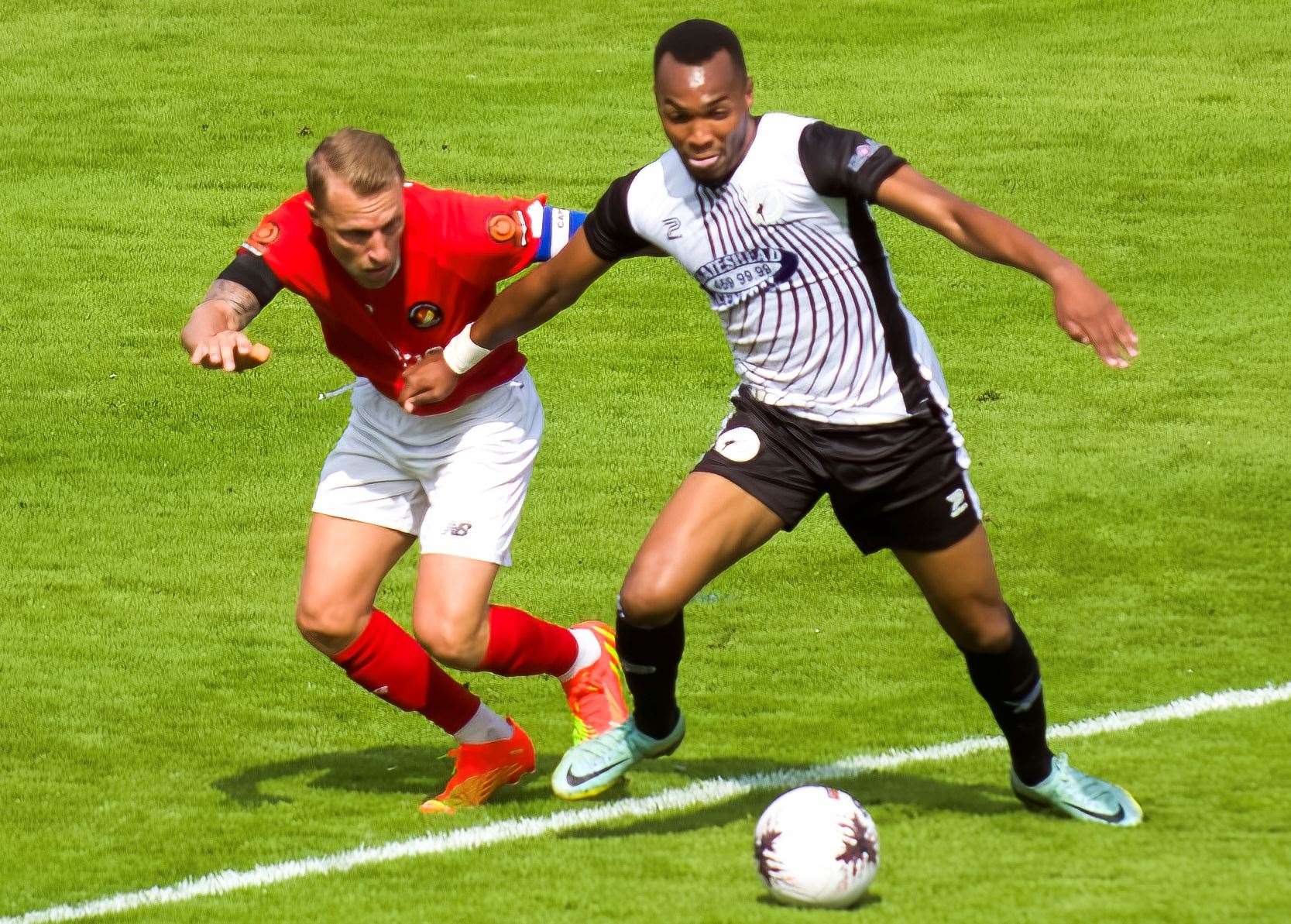 Ebbsfleet defender Chris Solly gets tight to Gateshead's former Dartford striker Marcus Dinanga on Saturday. Picture: Ed Miller/EUFC