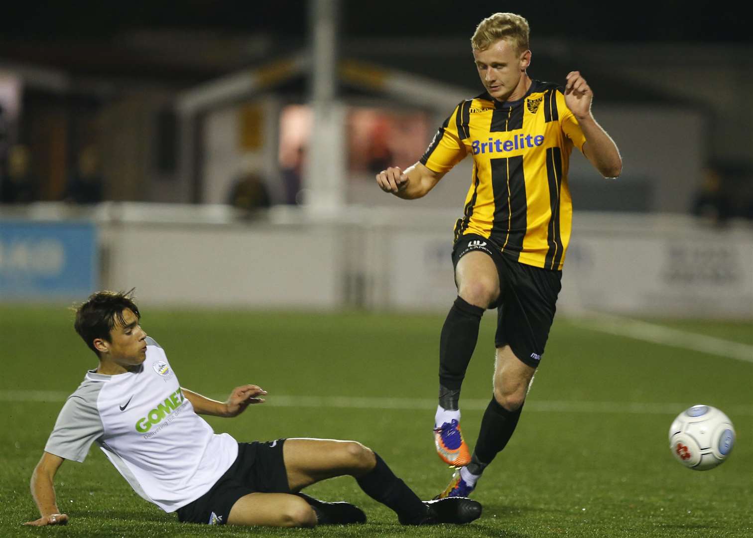 Maidstone's George McLennan takes on Dover's Lewis Cotter Picture: Andy Jones