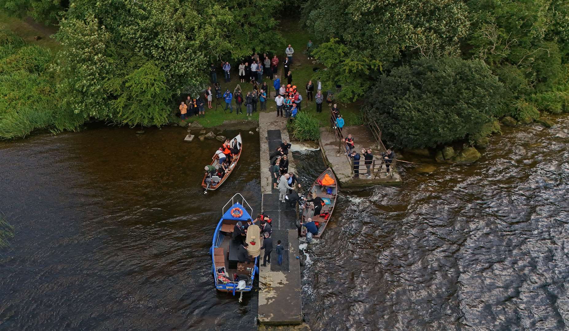 Boats accompanied O’Brien’s coffin to its final resting place on Holy Island (Niall Carson/PA)