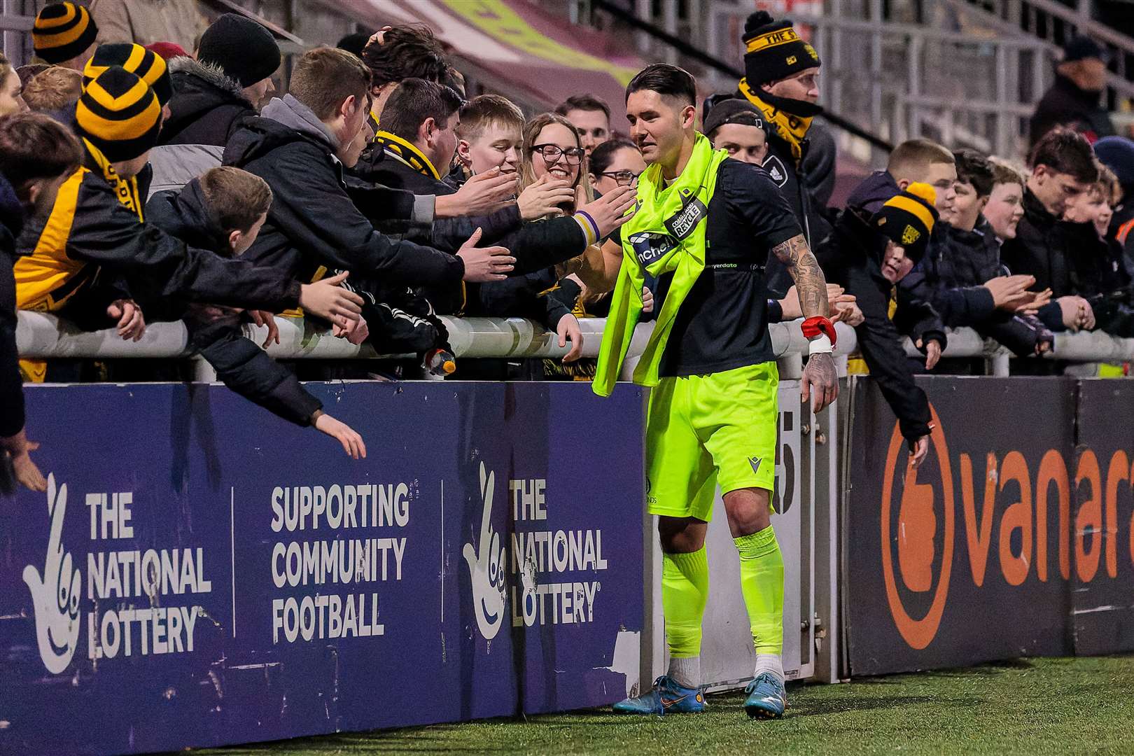 Harley Earle celebrates with Maidstone fans after his decisive penalty save against Punjab in the Kent Senior Cup quarter-finals. Picture: Helen Cooper