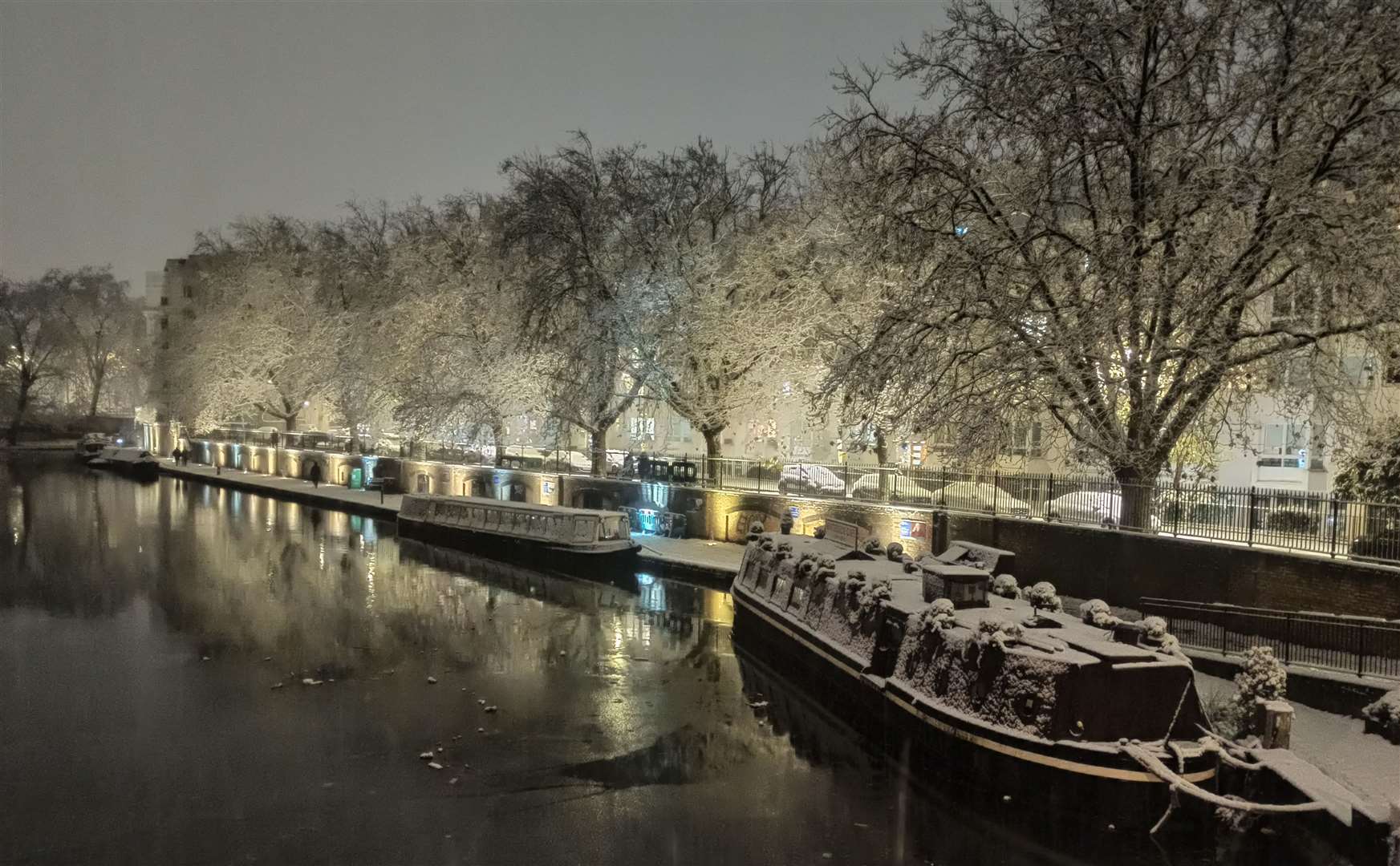 Wintry conditions for barges moored in Little Venice, London (Catherine Wylie/PA)