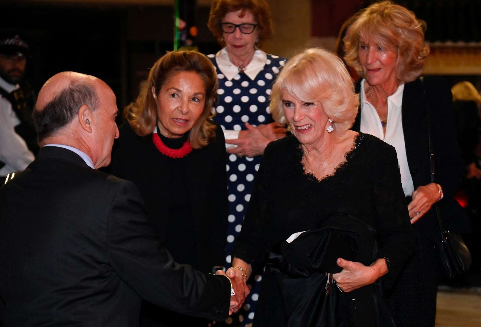 The Queen Consort and her sister Annabel Elliot with Mark Damazer, chairman of the Booker Prize trustees (Toby Melville/PA)