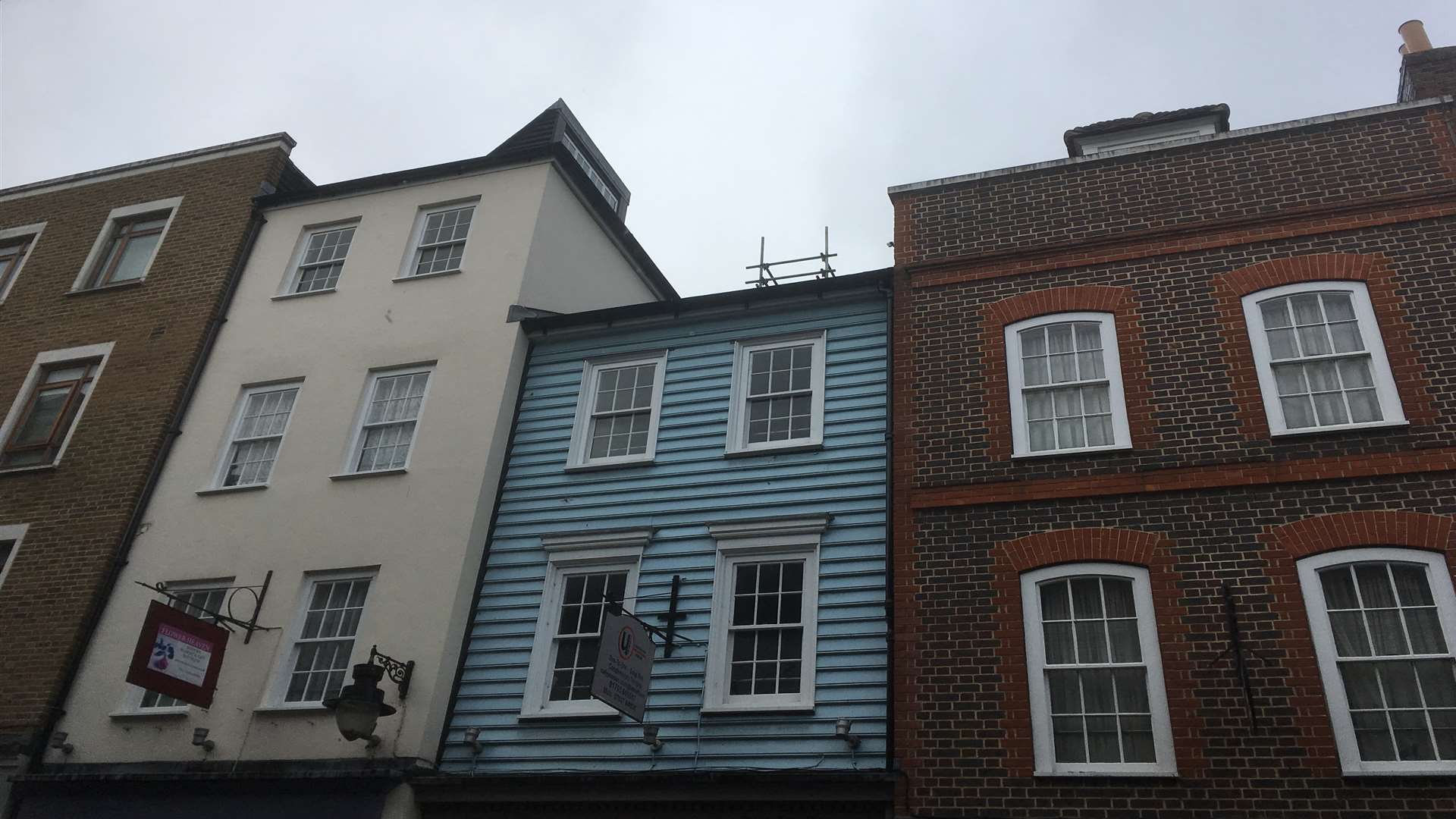 The board fell from scaffolding above the High Street