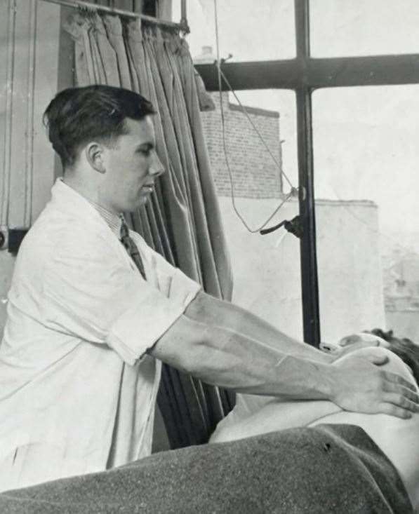 The late Sheppey physiotherapist Harry Kennett working at Sheppey General Hospital. Picture: Klare Kennett