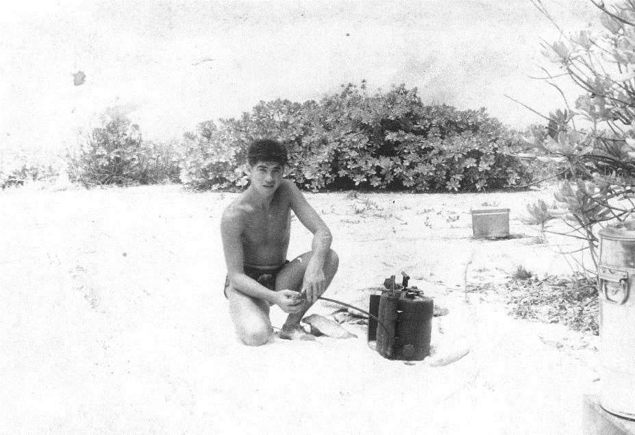 Terry Quinlan brewing up - there was no fresh water on Christmas Island