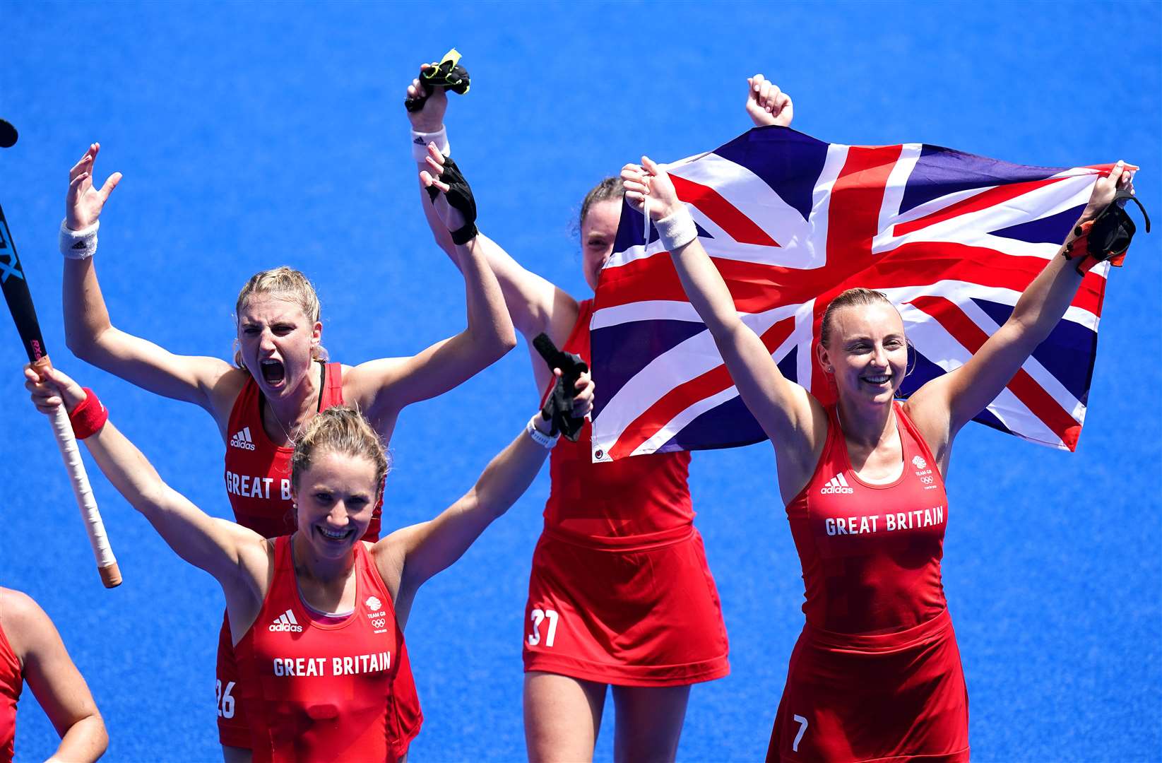 Match-winner Grace Balsdon, centre, and Great Britain team-mates celebrate bronze at the Tokyo Olympics. Picture: Adam Davy
