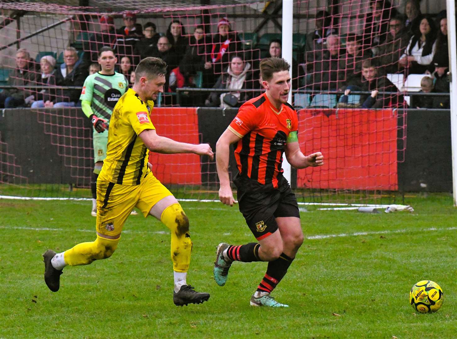 Sittingbourne captain Liam Smith is closed down by Sheppey's Dan Bradshaw on Boxing Day. Picture: Marc Richards