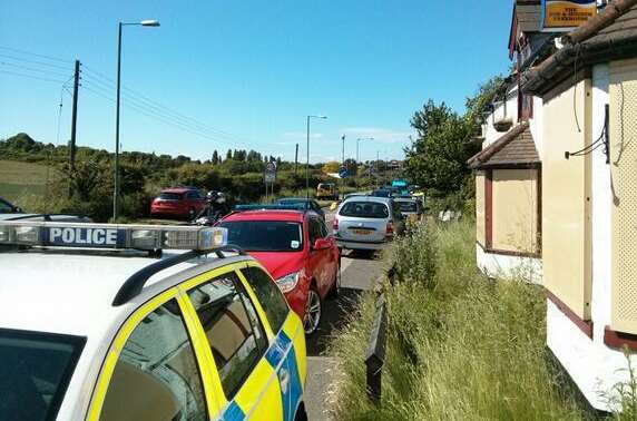 Police during an eight-hour stand-off in Wood Lane, Darenth. Picture: Oli Horwood