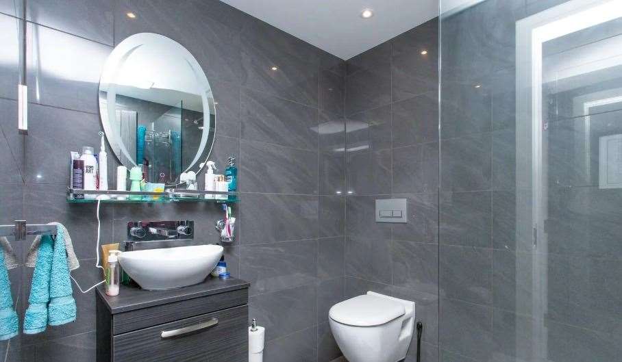 There is a family shower room as well as an en suite in one of the bedrooms. Picture: Miles and Barr
