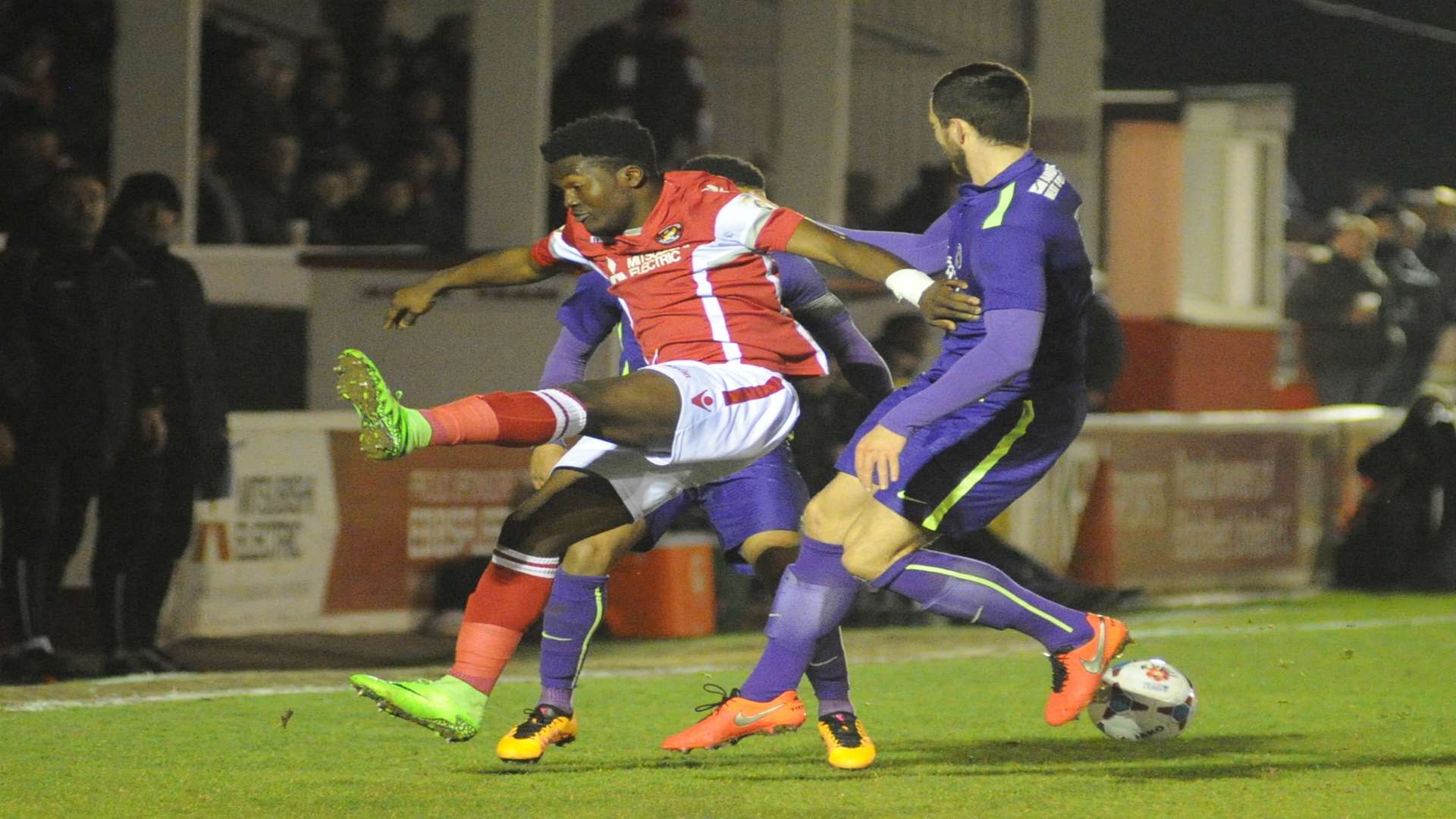 Ebbsfleet striker Jeff N'Guede finds himself outnumbered Picture: Steve Crispe