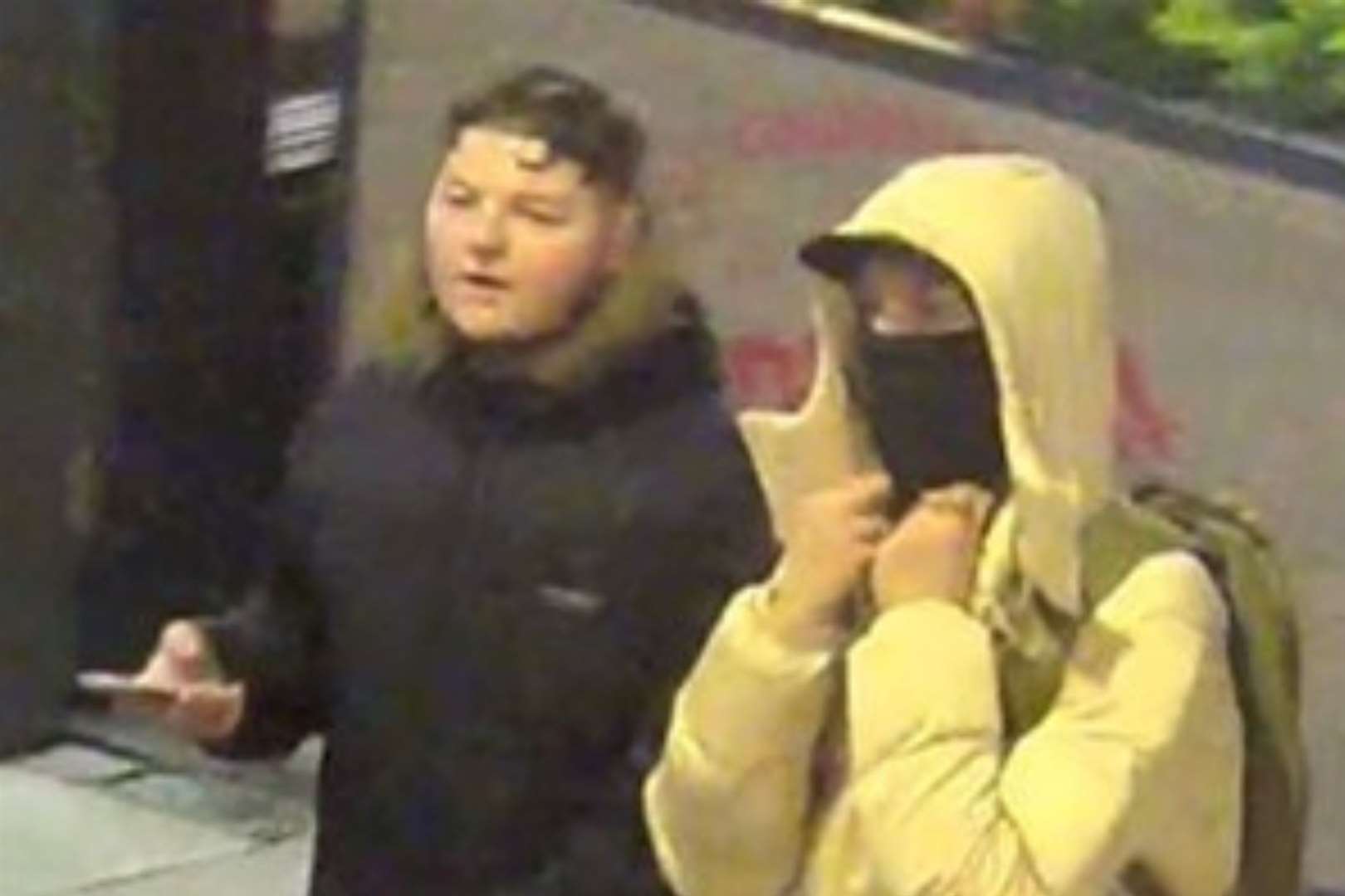 Police have released a CCTV image of two men they would like to speak to following an attack in Canterbury High Street. Picture: Kent Police