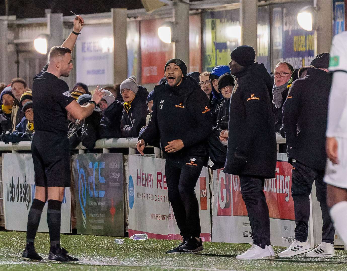 Assistant manager Craig Fagan's face says it all as George Elokobi is booked against Dartford. Picture: Helen Cooper