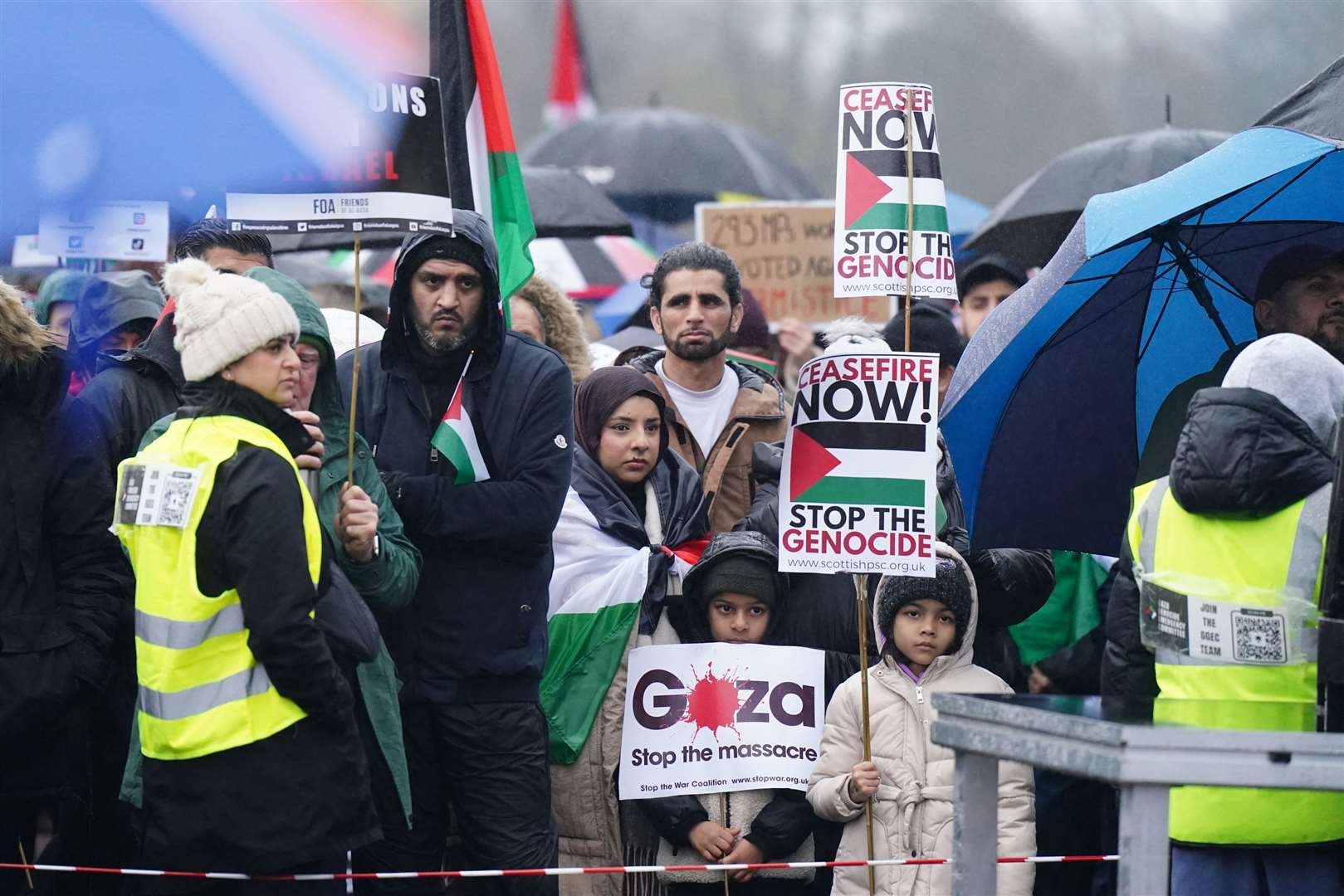 Those taking part were urged to write their names on their arms (Jane Barlow/PA)