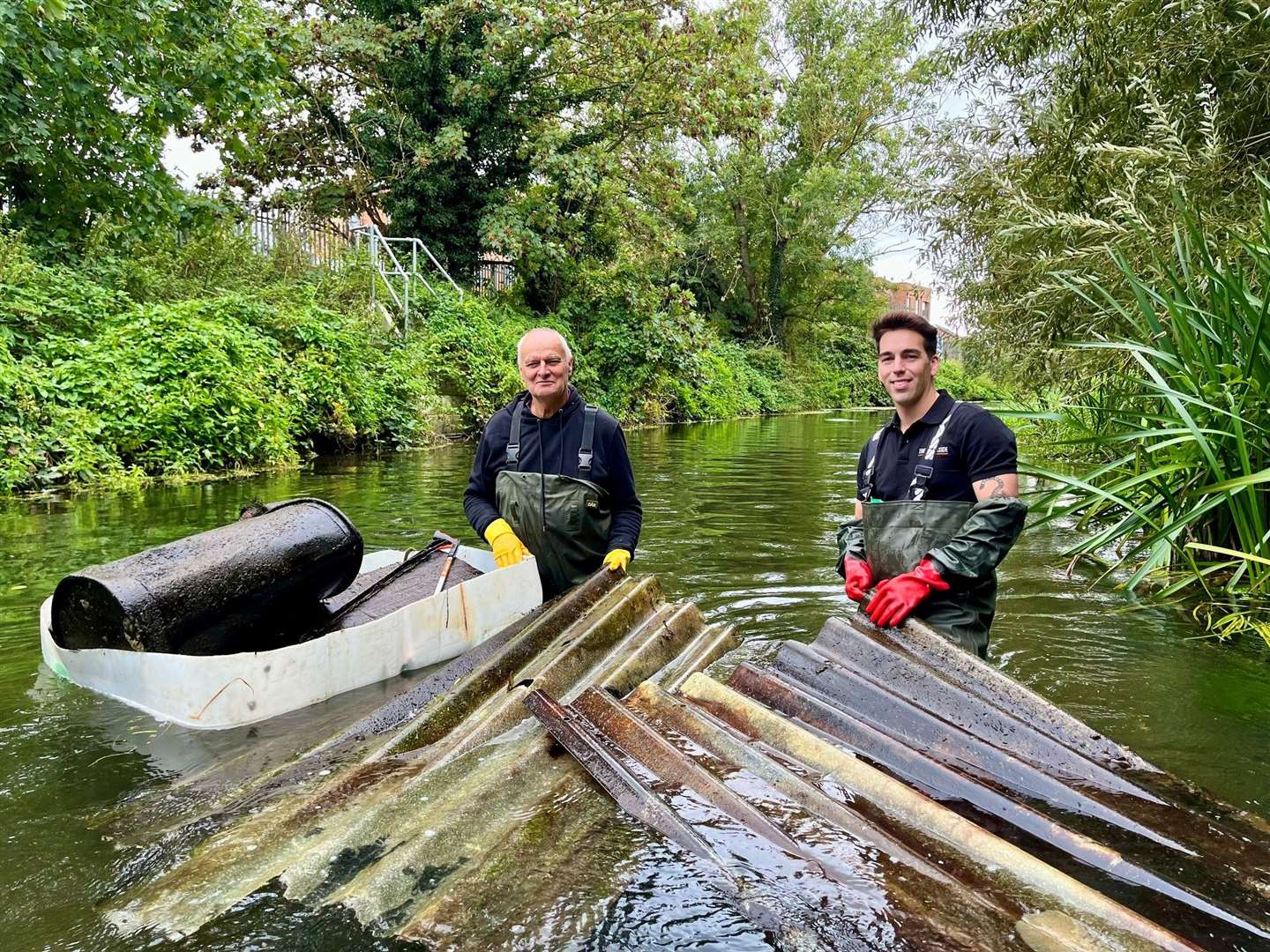 Volunteers removed corrigated sheeting and other debris form the river Stour in Canterbury