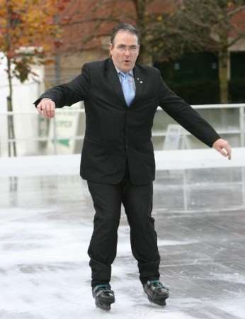 Town Centre Manager, Ian Payne, gets to grip with the ice rink in Queen's Gardens, Kentish Way, Bromley, last year.