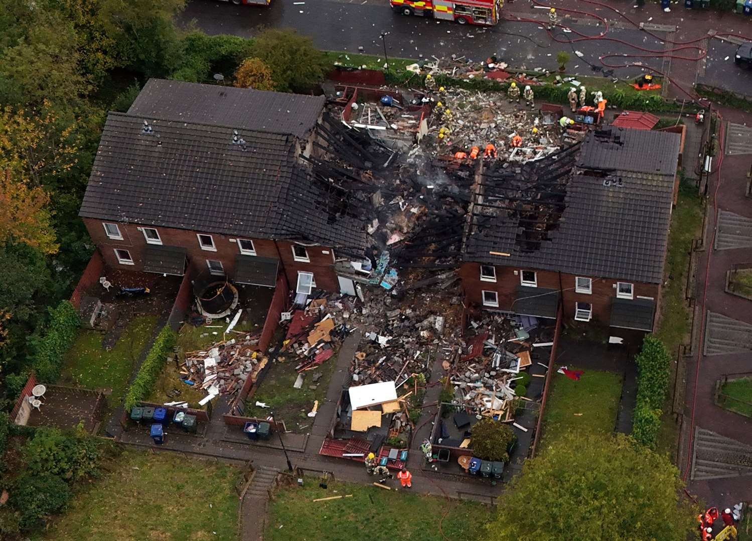 Drone pictures show at least one house appears to have been completely destroyed (Owen Humphreys/PA)