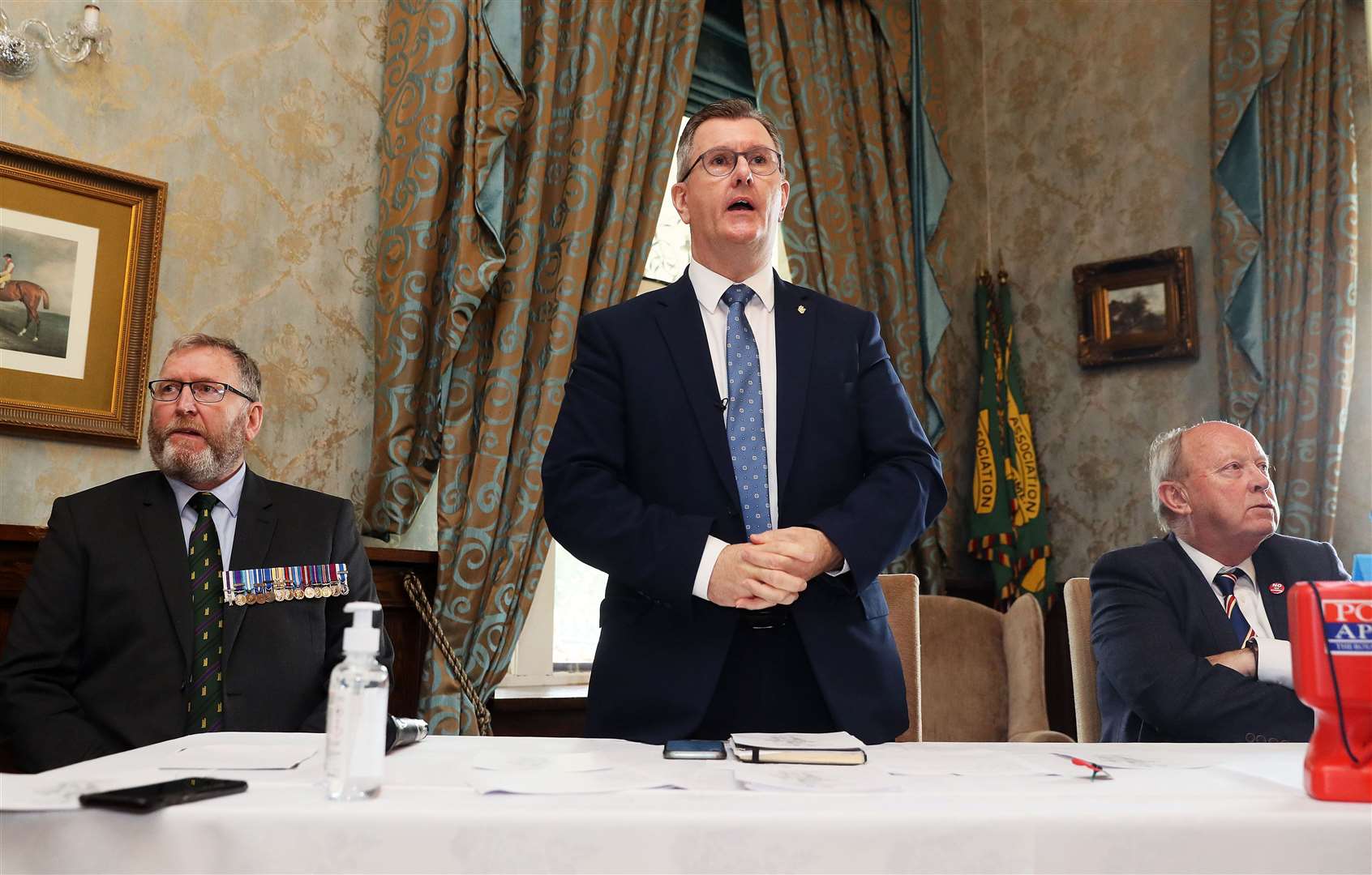 DUP leader Sir Jeffrey Donaldson (centre), UUP leader Doug Beattie (left) and TUV leader Jim Allister at an event for families of murdered UDR soldiers in Co Tyrone (Brian Lawless/PA)