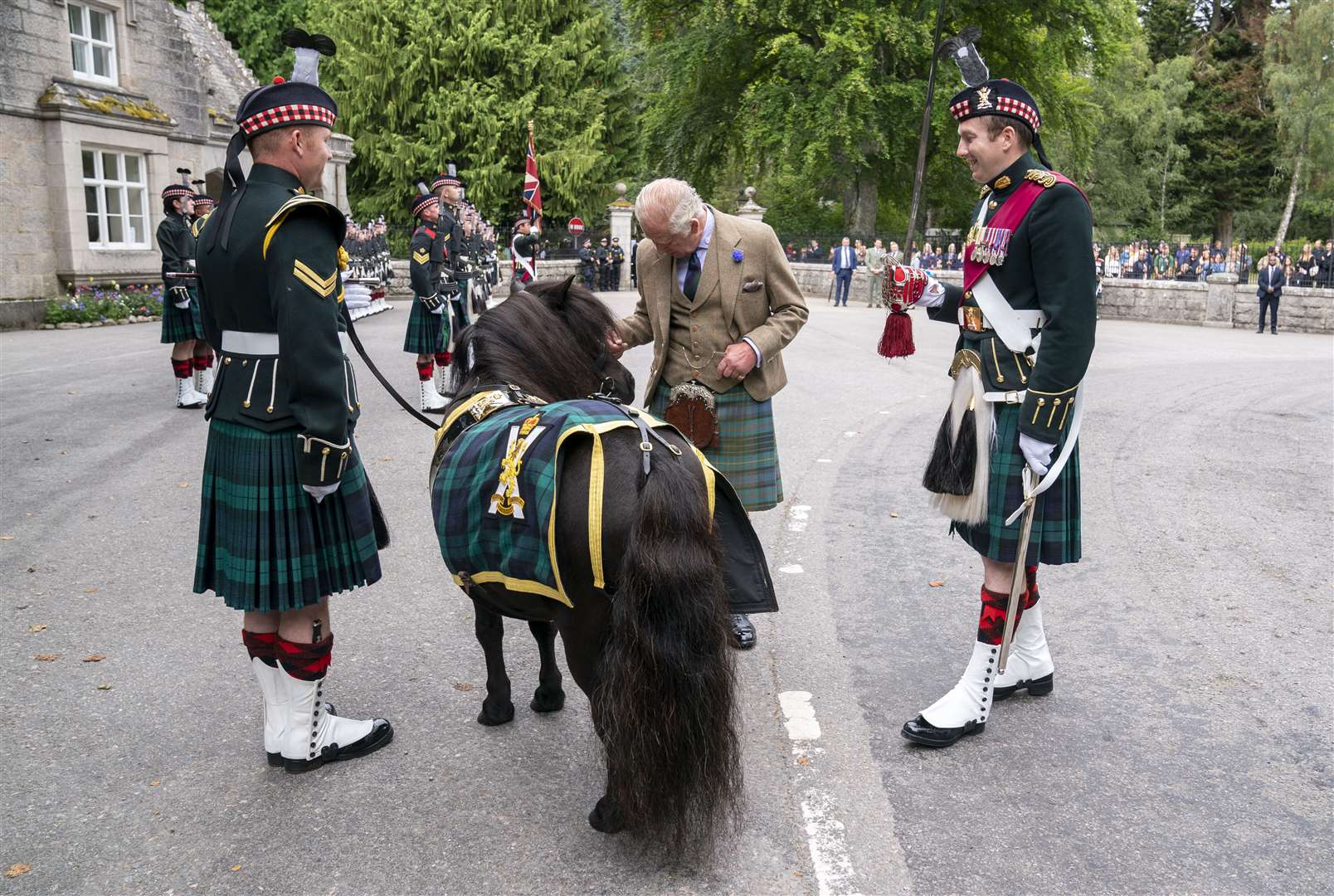 The King made friends with a Shetland pony at a ceremony marking his official arrival at Balmoral. Charles met Corporal Cruachan IV, the mascot of the Royal Regiment of Scotland, as he took up residence for the summer (Jane Barlow/PA)