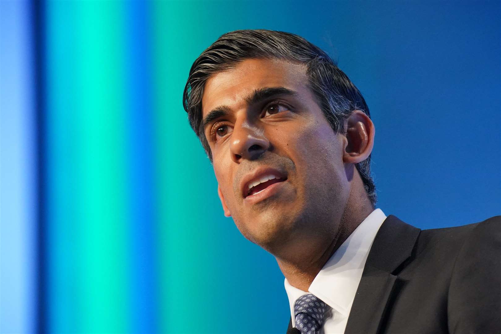 Chancellor Rishi Sunak has pledged to cut the basic rate of income tax from 20p to 19p in the pound (Jonathan Brady/PA)