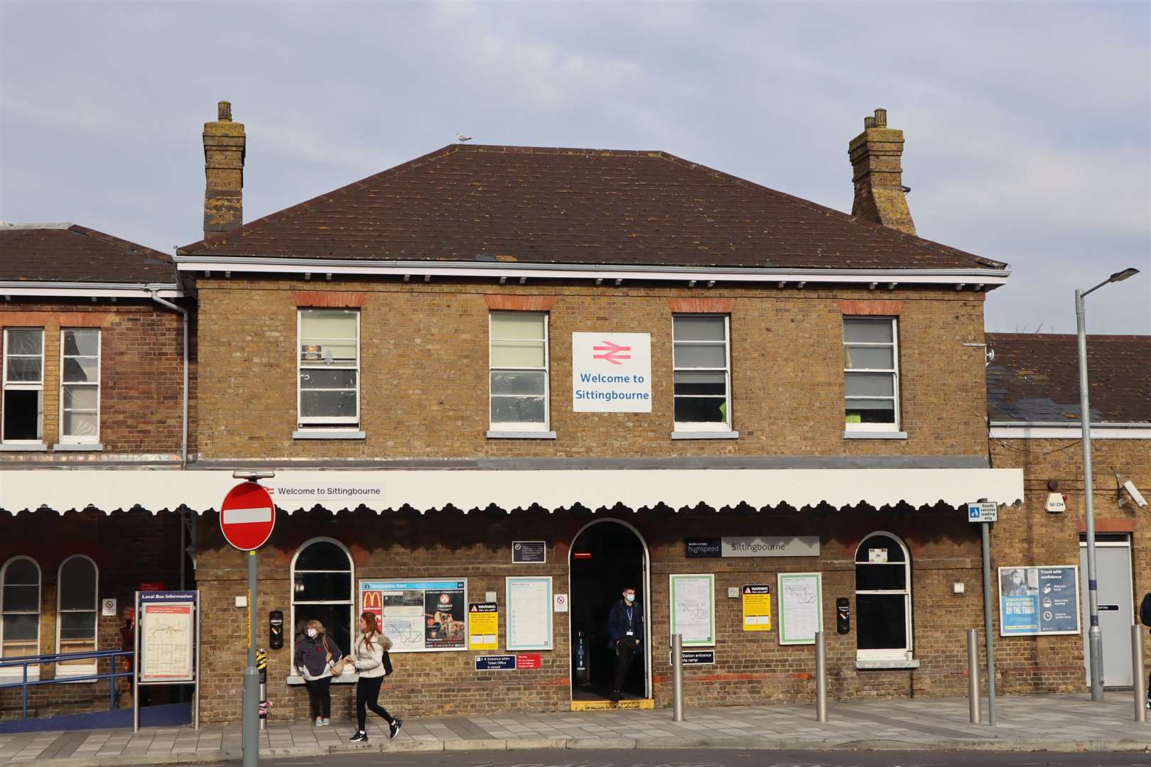 Two men in ski masks allegedly threatened the youngsters outside Sittingbourne railway station