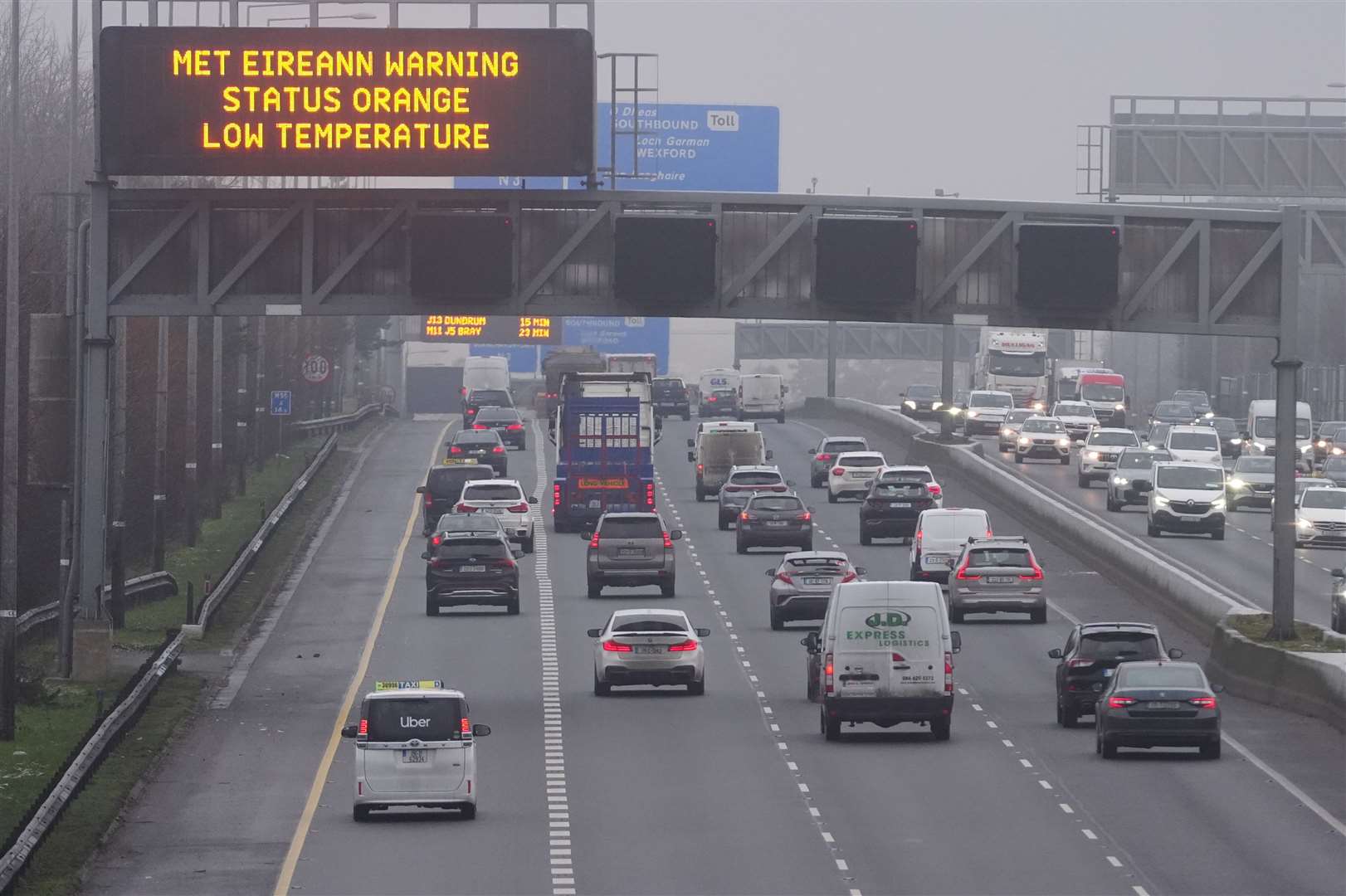 A weather warning sign on the M50 near Dublin on Thursday (Brian Lawless/PA)