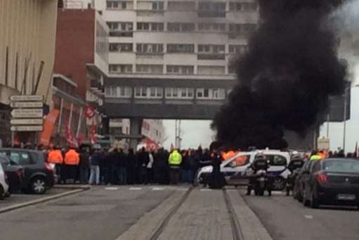 The demo outside the Calais Chamber of Commerce which runs the port