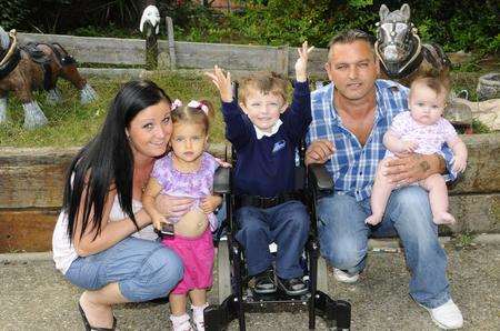 Charlie with his parents Lianne and Archie and two of their other children, Shannon, two, and Priscilla, five months.