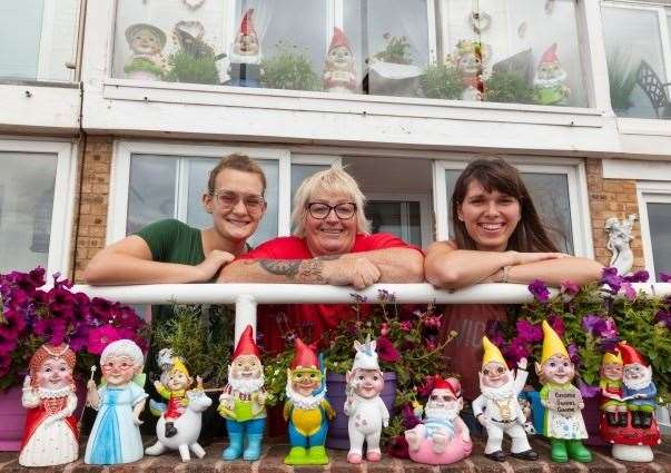 Janet Wilson and her daughters Adel and Karina with their collection of Asda gnomes. Picture: Asda