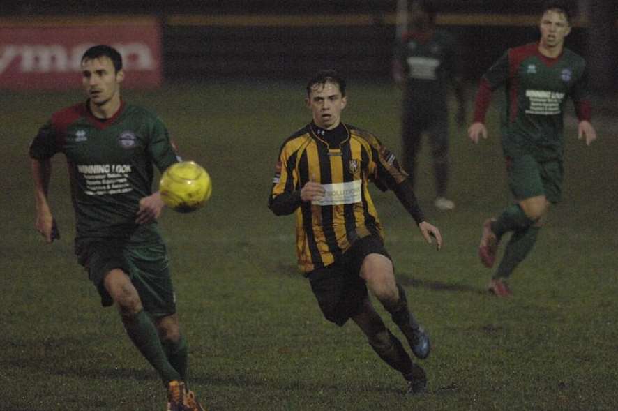 Folkestone Invicta's hat-trick hero Johan Ter Horst runs at Crawley Down