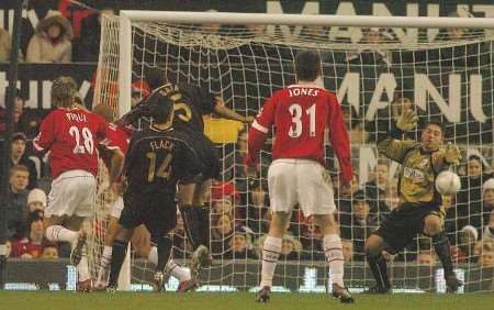 SHUT OUT: Paul Jones (far right) in action during the 0-0 draw at Old Trafford. Picture: MATT MINSHULL (EXETER EXPRESS AND ECHO)