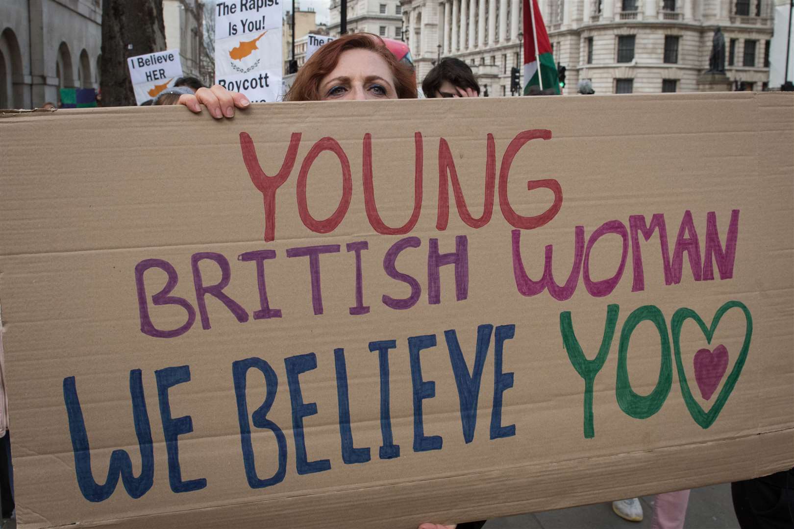 People outside Downing Street in central London, as they take part in a protest march in support of the woman (Stefan Rousseau/PA)