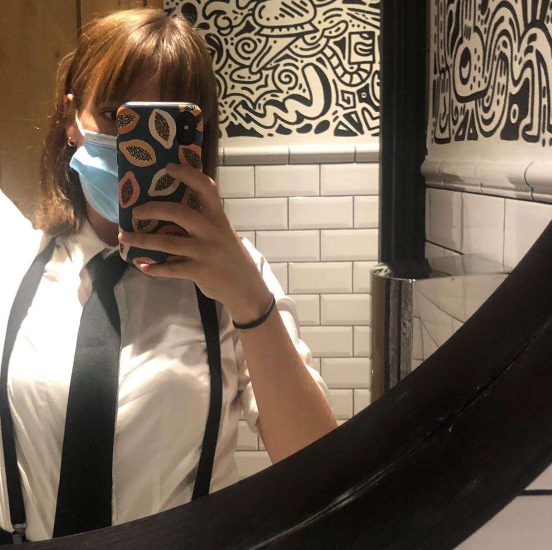 Lotte Brundle works part-time as a bartender in Canterbury