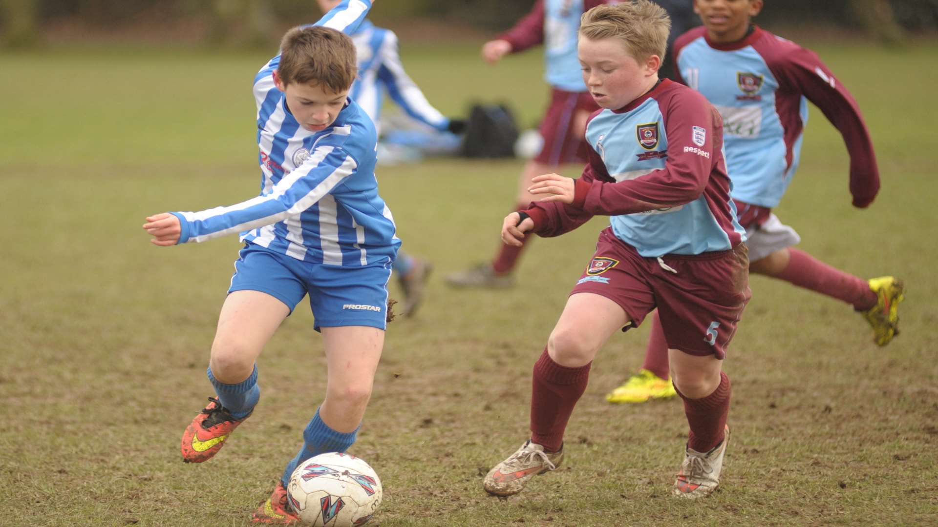 Chatham Riverside (blue) accelerate away from Wigmore Youth in Division 2 Picture: Steve Crispe