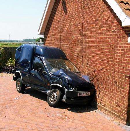 The Vauxhall Astra van was shunted into house Faversham Road by the refuse truck