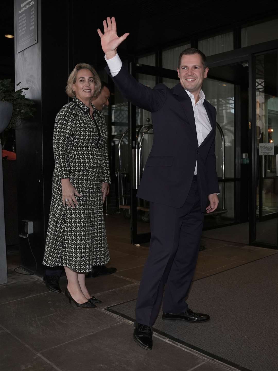 Robert Jenrick with his wife Michal Berkner arriving in Birmingham (Stefan Rousseau/PA)