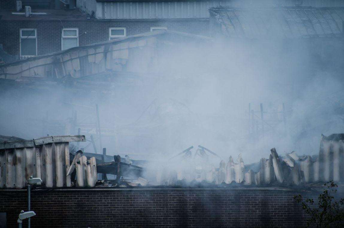 Firefighters remain at the scene of a blaze at a Dartford coffee factory. Picture: @chrispiela (4756072)