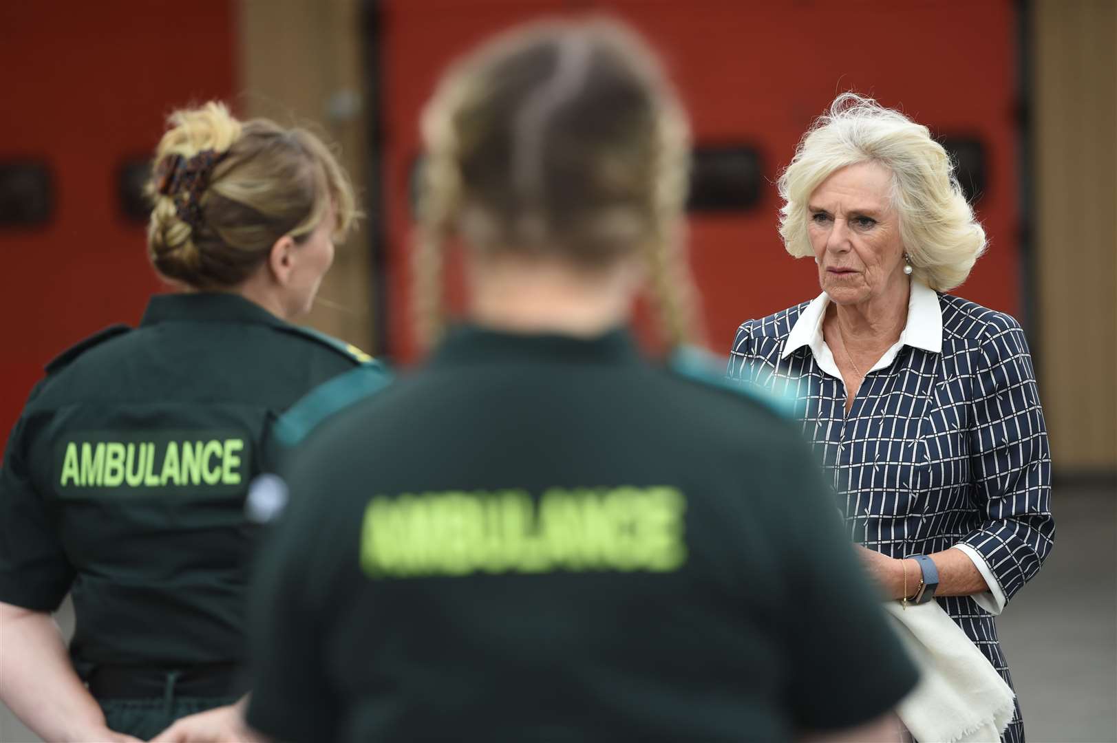 Camilla met firefighters, staff from Great Western Hospital and paramedics from South Western Ambulance Service (Eddie Mulholland/The Daily Telegraph)