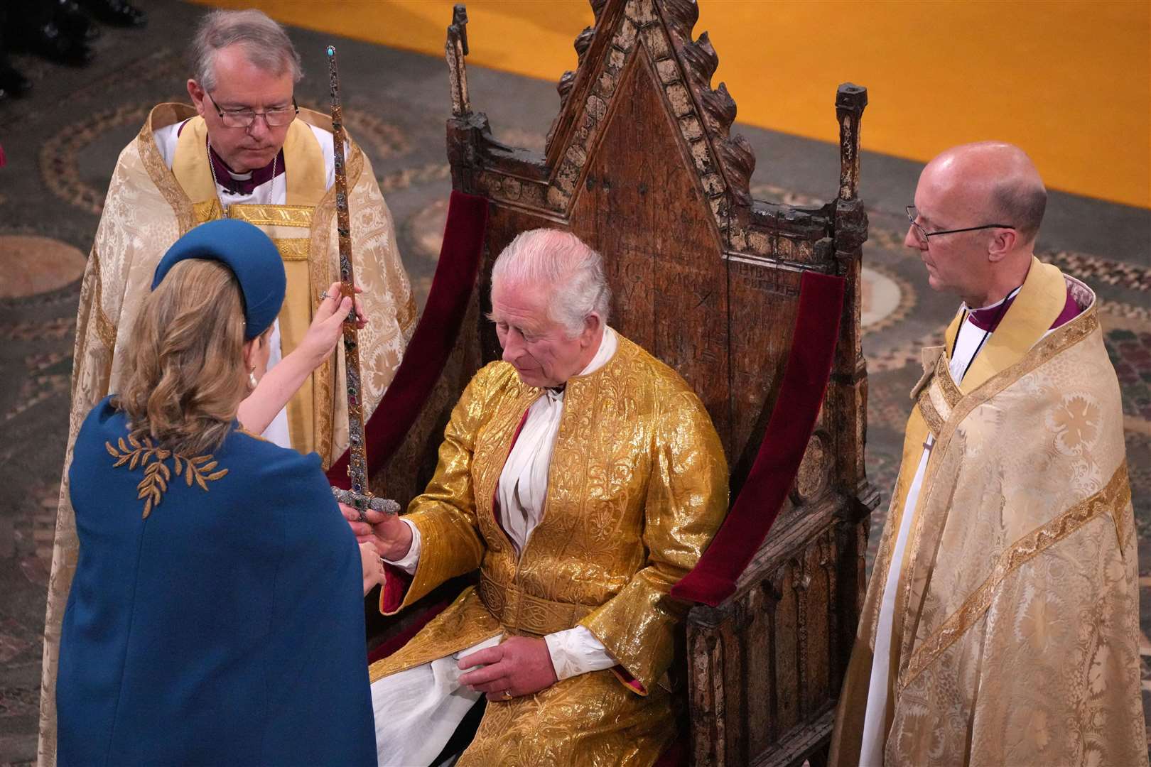 Penny Mordaunt presenting the sword to Charles (Aaron Chown/PA)