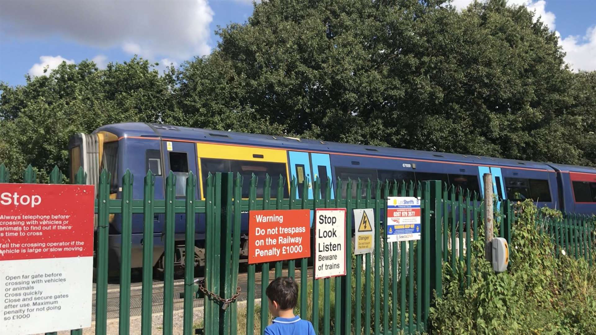 A train passing the access point on the railway track at the junction of Volante Drive and Middletune Avenue, Milton Regis, Sittingbourne (39857979)