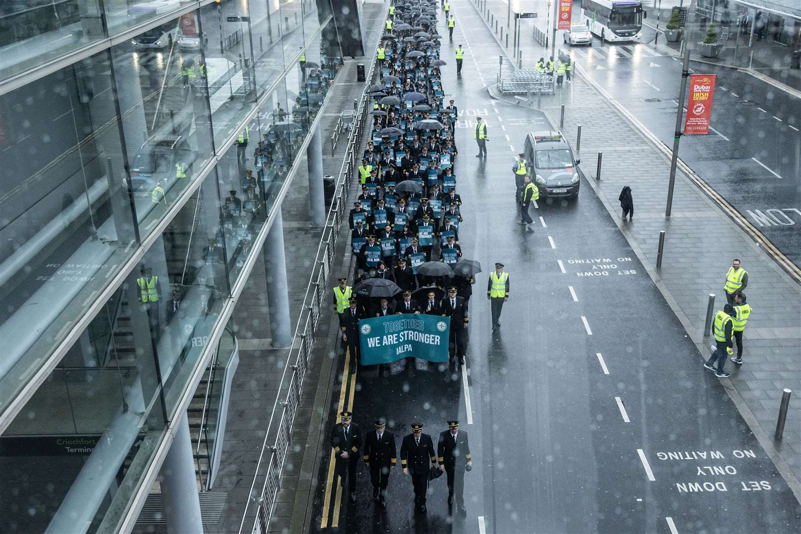 Aer Lingus pilots march around Dublin Airport (Evan Treacy/PA)