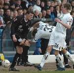 MOMENT OF MADNESS: Darius Henderson hauls Michael Gray to the ground before both players were sent off. Picture: GRANT FALVEY