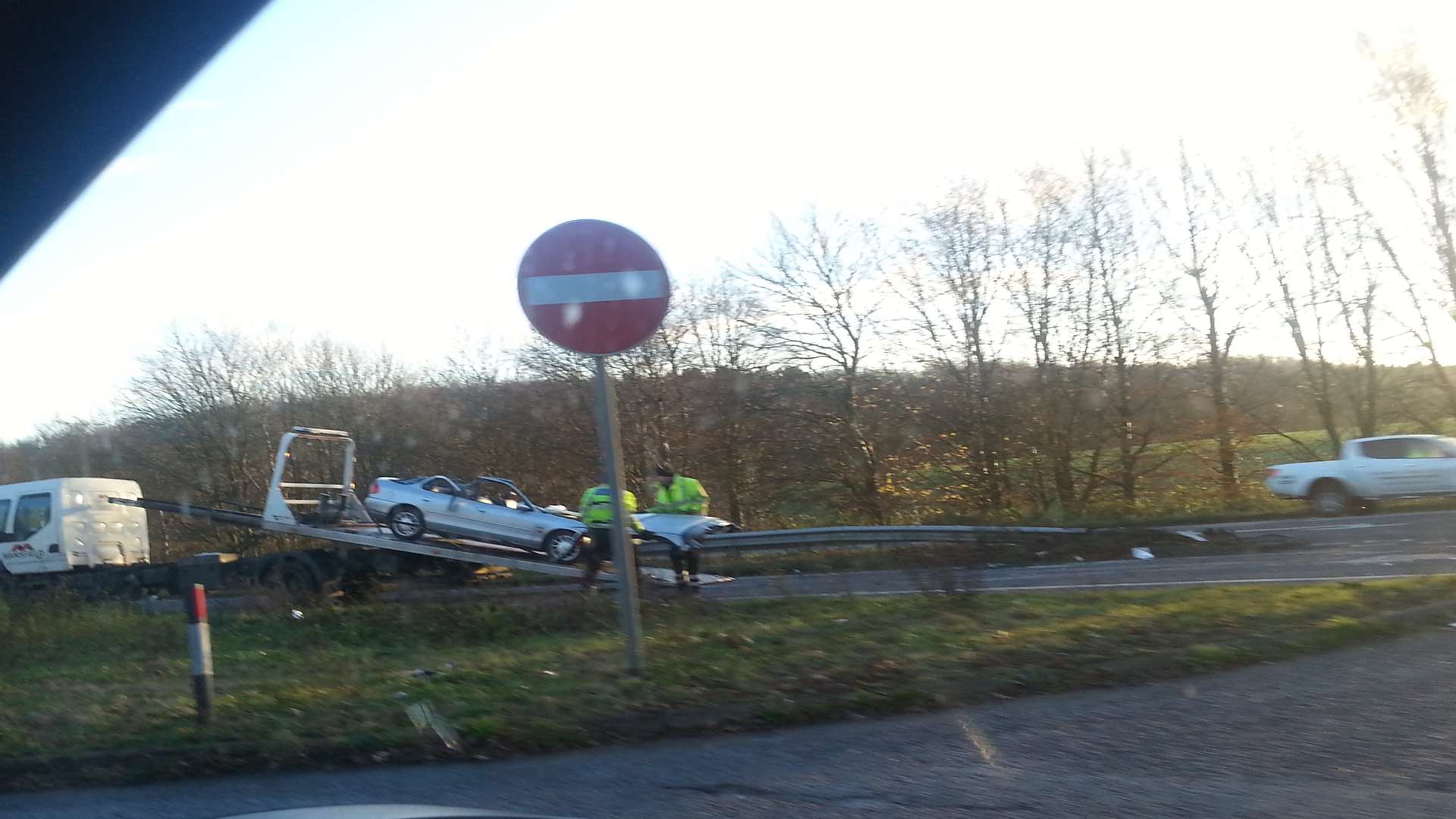 Emergency services recover the vehicle involved in the crash