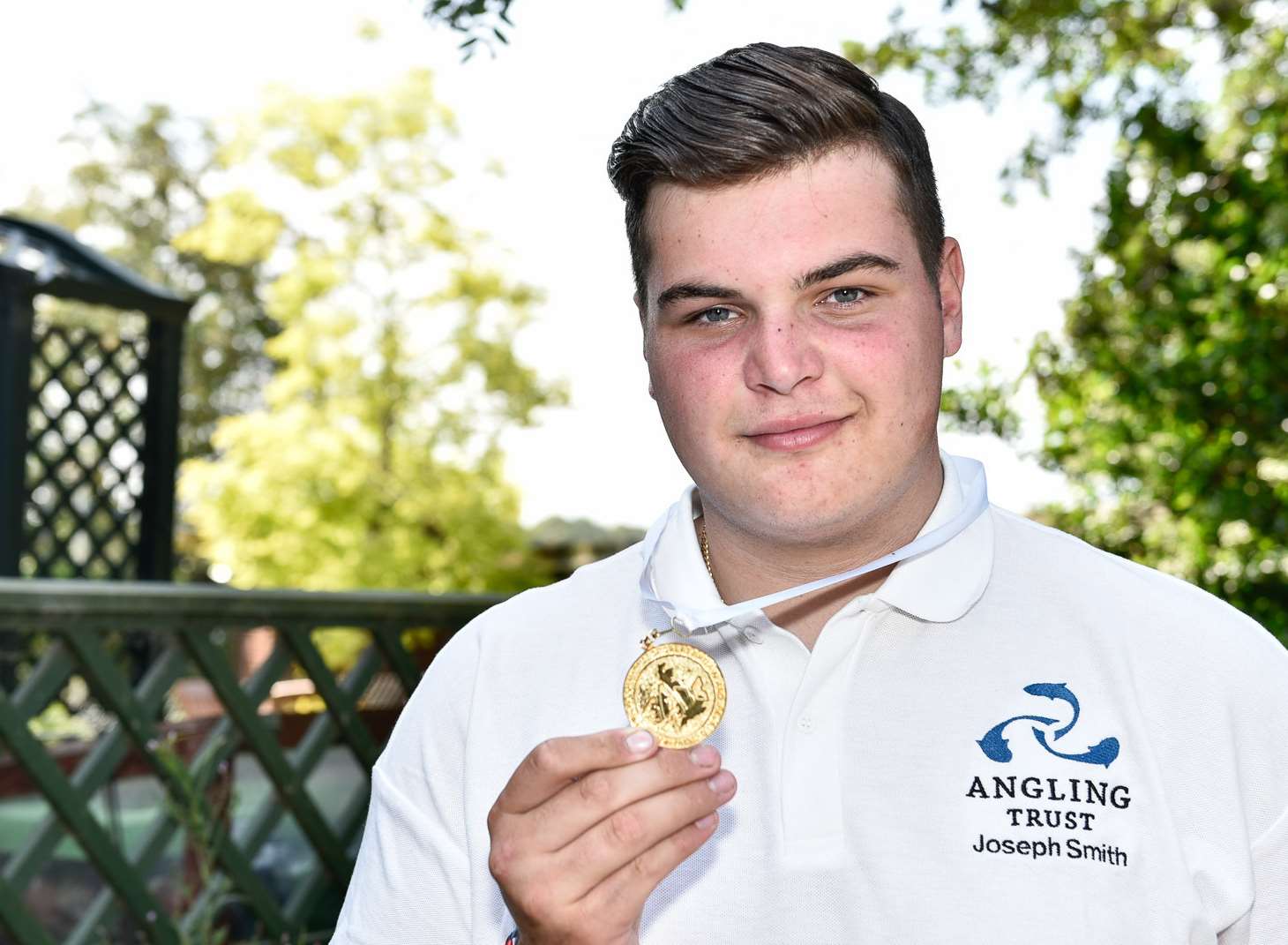 16-year-old Joseph Smith with his gold medal