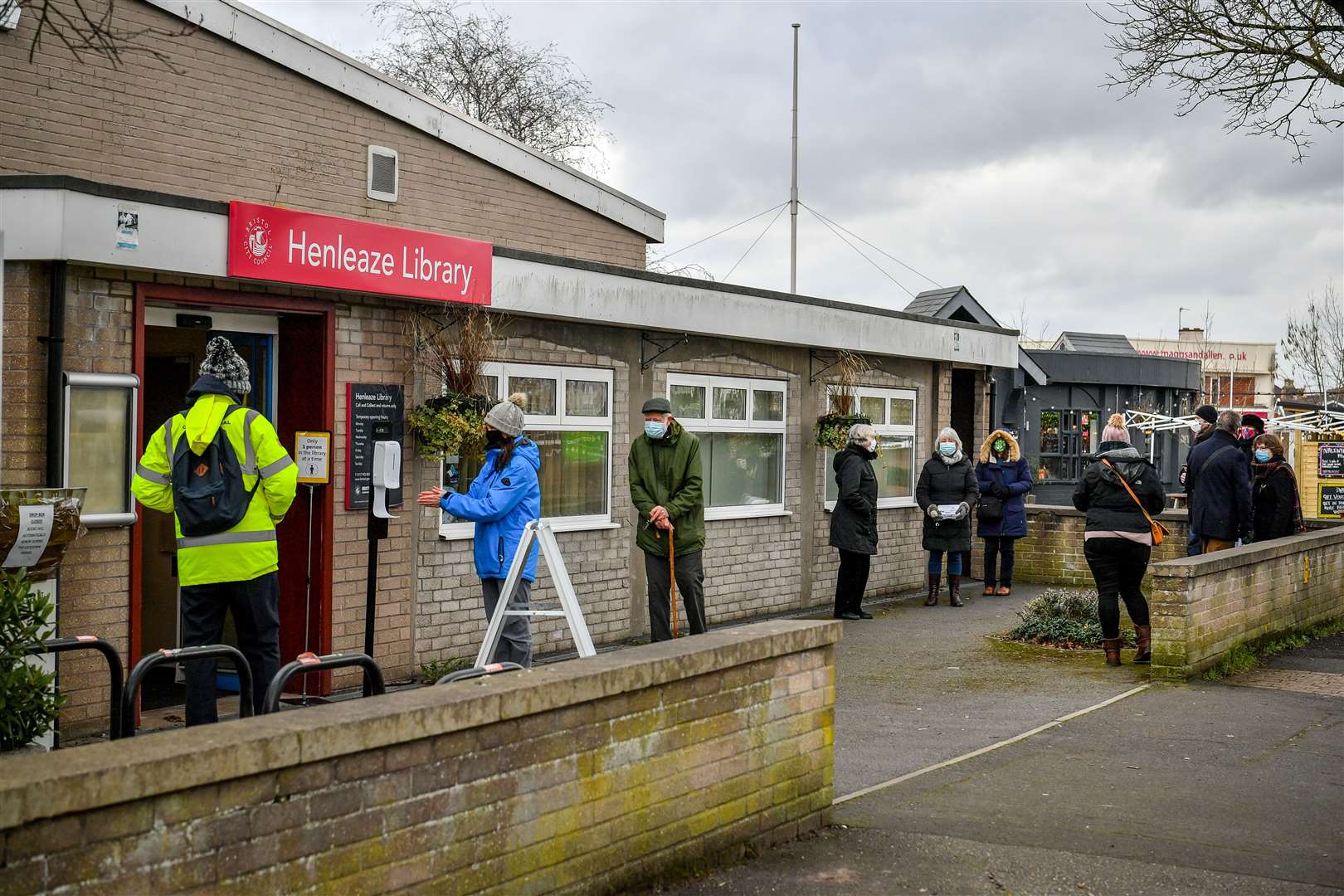 People wait in a queue for a coronavirus test at a surge test centre (Ben Birchall/PA)