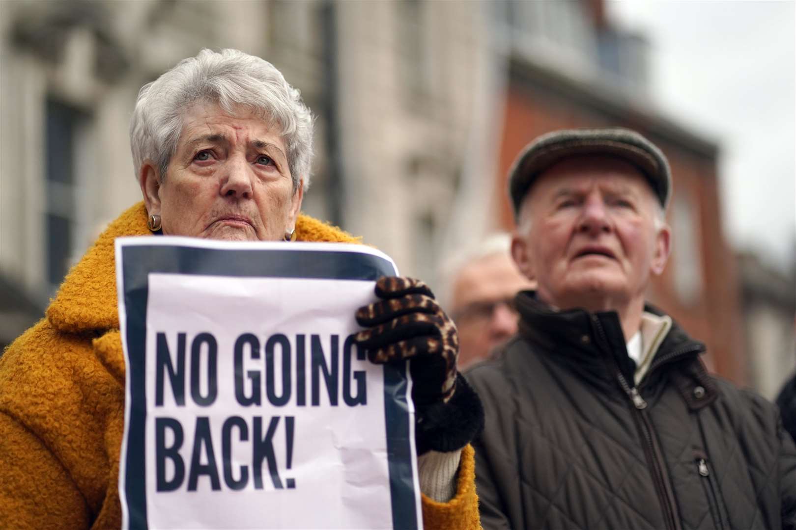 People taking part in a rally outside Omagh Courthouse to unite against paramilitary violence after the shooting of Detective Chief Inspector John Caldwell (Brian Lawless/PA)