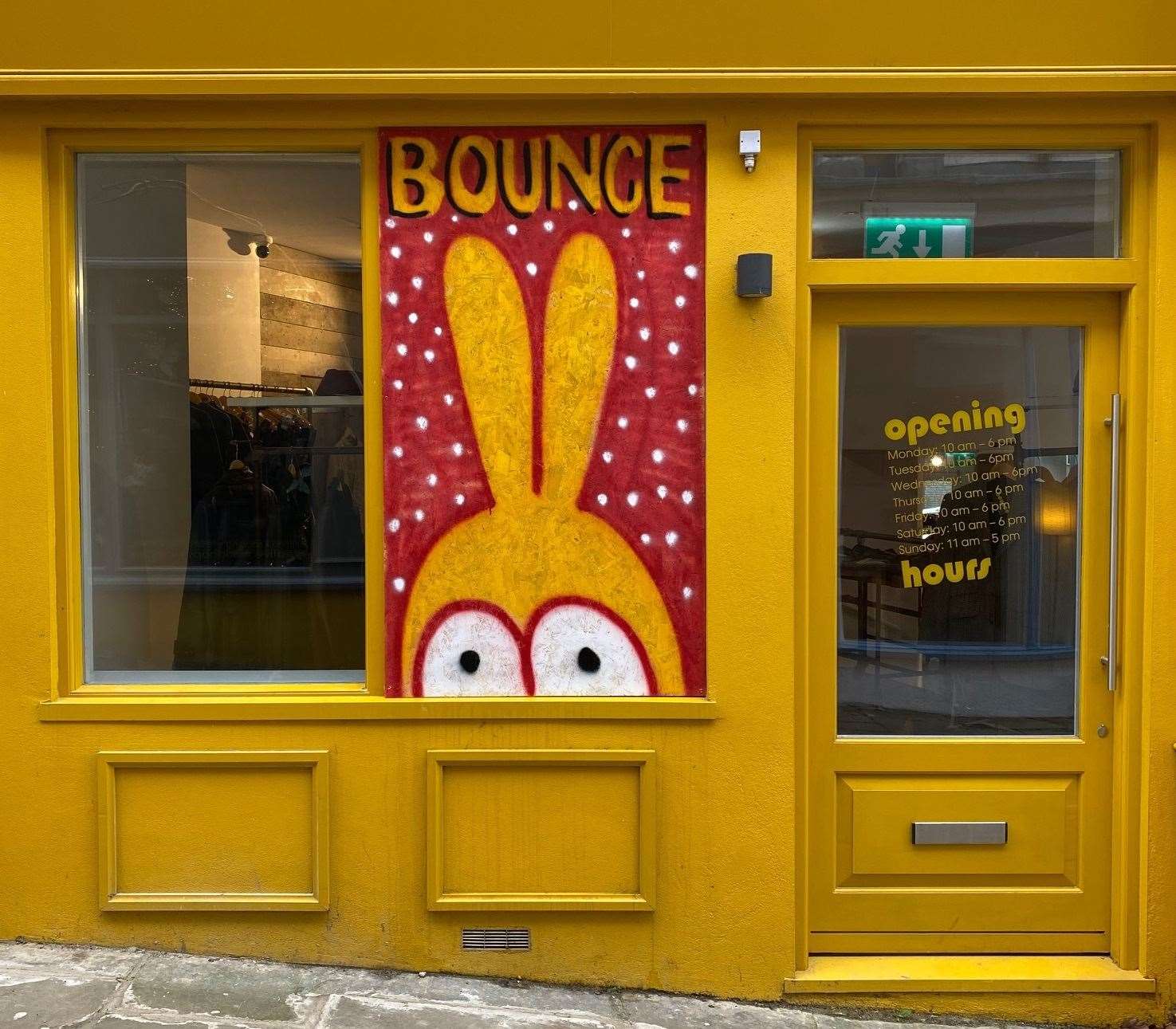 The owners of Bounce Vintage had their shop window smashed during the spree. They have since put boarding up, painted by artist Duncan Weston. Picture credit: Bounce Vintage