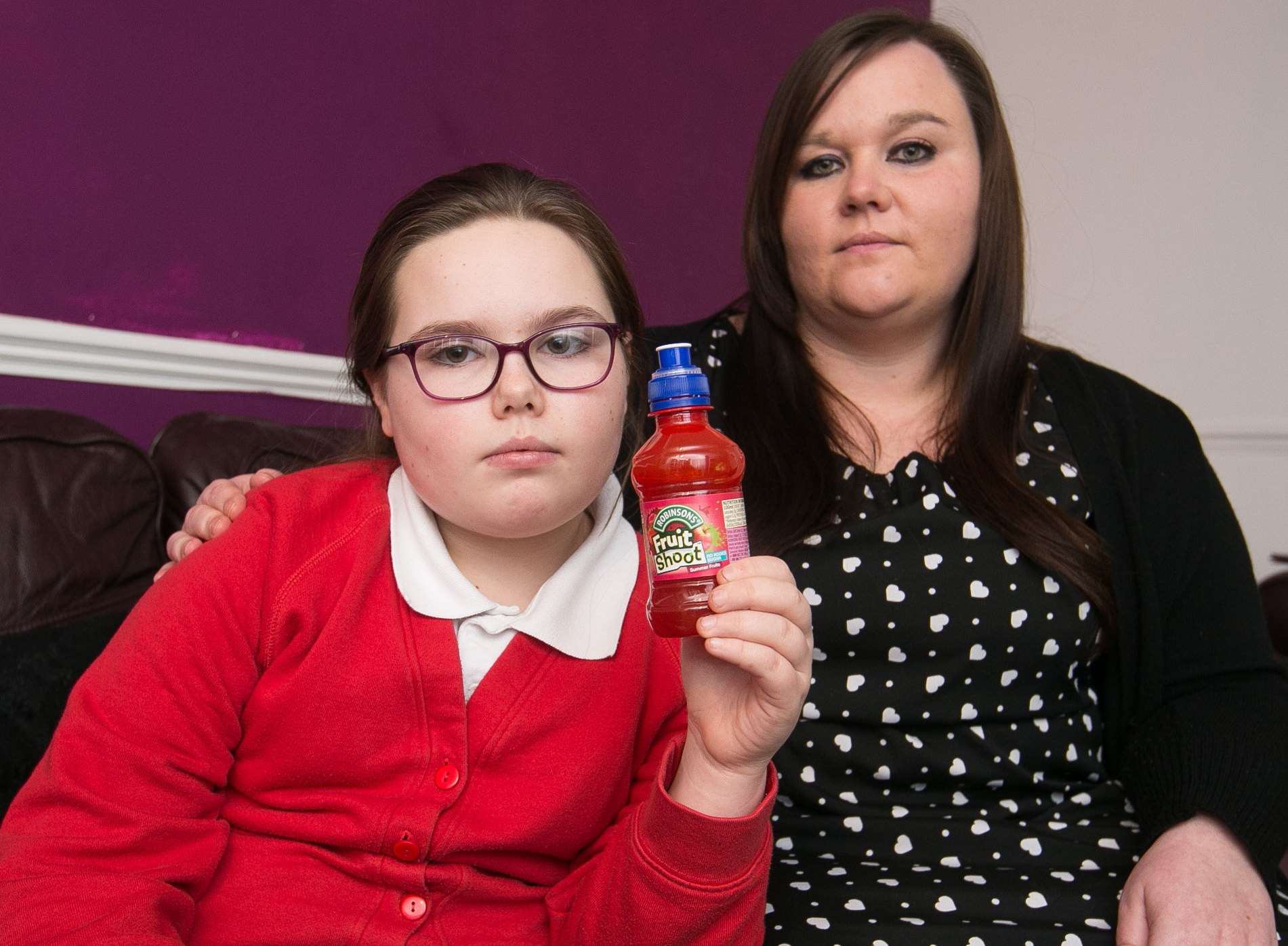 Ellie Robinson-Smith, 11, with her mum Sammi Smith. Picture: SWNS.