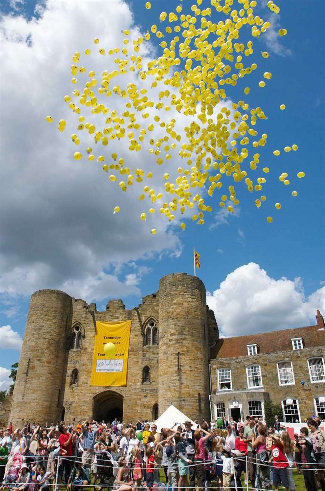 Dozens of yellow balloons were released into the blue sky. Pic; Linda Moreau